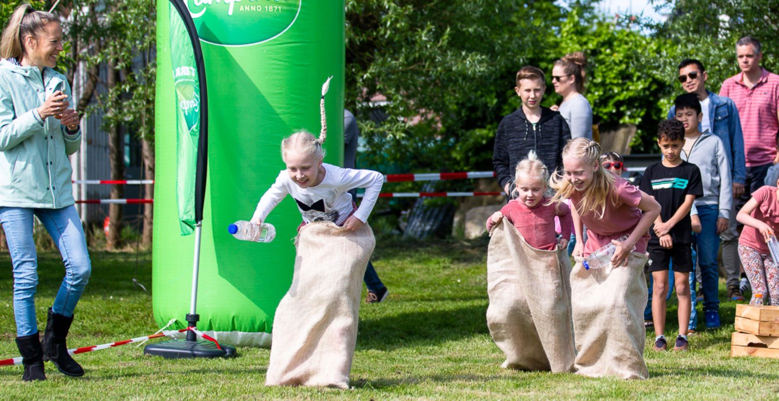 Voor kinderen zijn er allemaal leuke activiteiten, zoals een bowlingbaan met melkpakken en de 'melkweg race'. Foto: © Campina